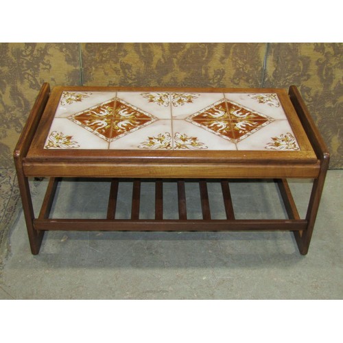 1174 - A retro teak rectangular occasional table with tiled top, 43cm high x 97cm x 51cm (af)