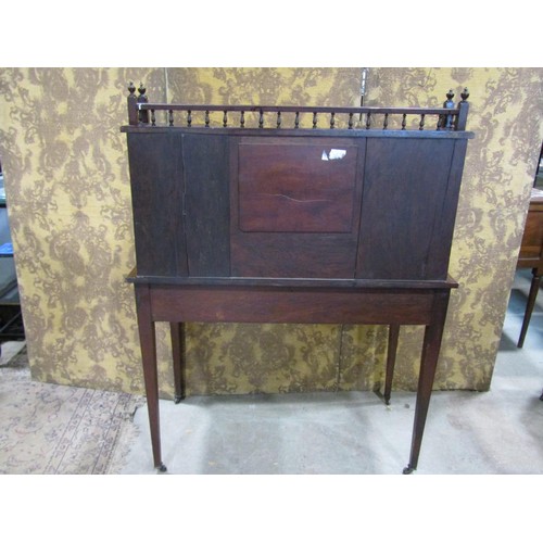 1188 - An inlaid Edwardian rosewood writing desk, the raised back incorporating two cupboards and central m... 