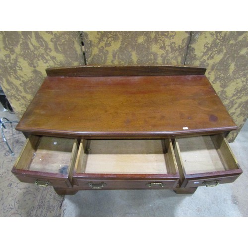 1192 - An Edwardian walnut bedroom chest of three short over two long drawers with shallow breakfront, 80cm... 