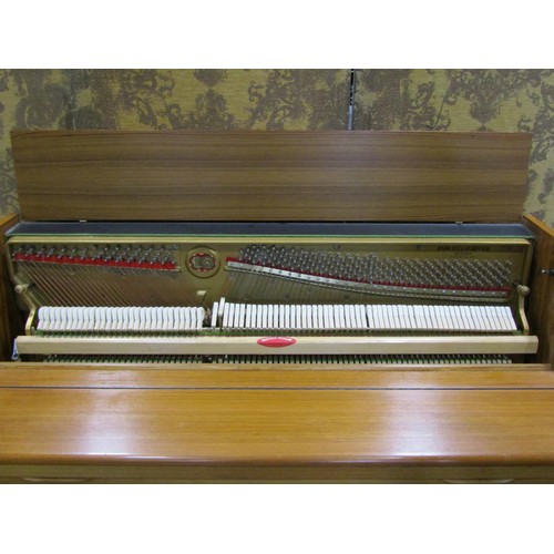 1193 - A Barrett and Robinson of London upright and overstrung piano in teakwood case, together with an ass... 