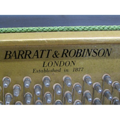 1193 - A Barrett and Robinson of London upright and overstrung piano in teakwood case, together with an ass... 