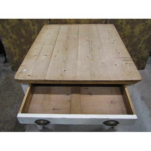 1197 - An antique pine scrubbed top kitchen table with rectangular boarded top, raised on later painted sup... 