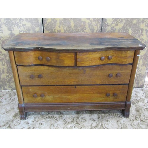 1201 - An antique oak chest with serpentine front over two long and two short drawers and shaped supports, ... 