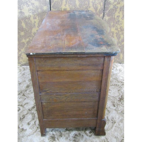 1201 - An antique oak chest with serpentine front over two long and two short drawers and shaped supports, ... 