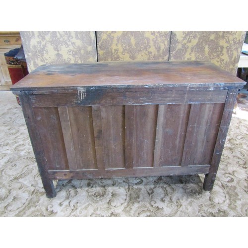 1201 - An antique oak chest with serpentine front over two long and two short drawers and shaped supports, ... 