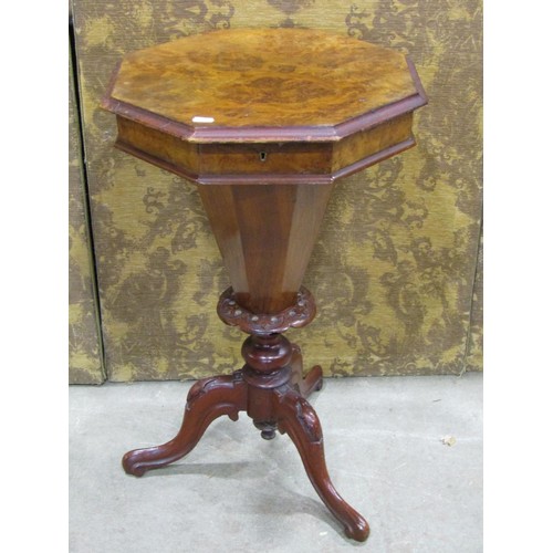 1204 - A Victorian walnut trumpet shaped sewing table of octagonal tapered form, raised on a carved and scr... 