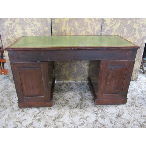 1207 - A Georgian style mahogany twin pedestal writing desk with inset leather top over an arrangement of n... 