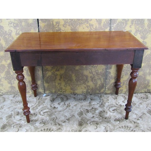 1210 - A Victorian mahogany side table with two frieze drawers on turned supports, 74cm high x 108cm x 53cm