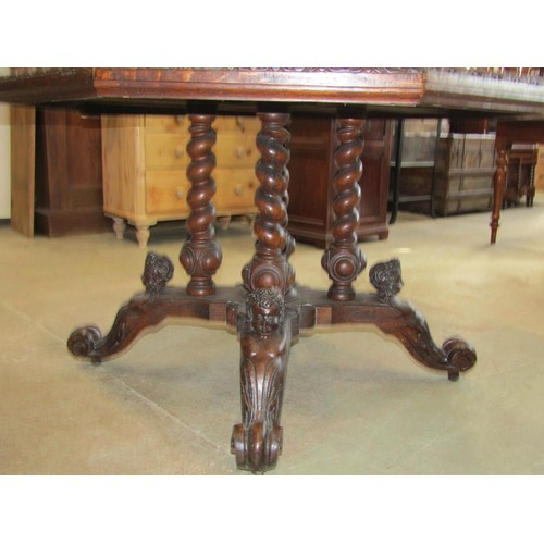 1212 - A Victorian oak centre table with octagonal top raised on spiral twist columns, set on a shaped plat... 