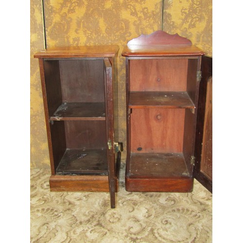 1214 - A Victorian mahogany bedside cupboard enclosed by a moulded arched panelled door, 87cm  (full height... 