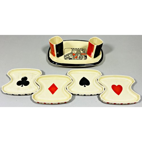 98 - A Royal Doulton novelty Art Deco playing card suit bridge set, containing four shaped dishes centred... 