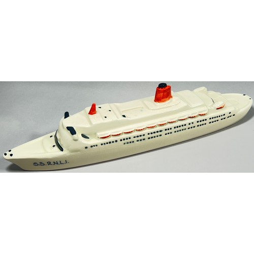 97 - A Carltonware porcelain model of a ship, ‘S.S R.N.L.I’, 37cm long and a novelty Carltonware playing ... 