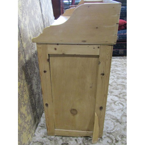 1218 - A antique stripped pine kitchen dresser enclosed by an arrangement of cupboards and drawers, 112cm h... 