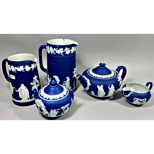 109 - A group of Wedgewood and similar blue and white wares together with a washing bowl and jug.