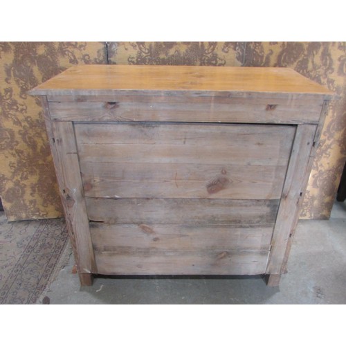 1227 - A 19th century continental stripped pine bedroom chest of three long and two short drawers flanked b... 