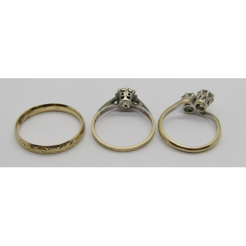 248 - Three rings comprising a 9ct two stone crossover dress ring, a 9ct silver set dress ring and a 9k we... 