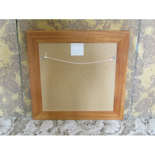 1242 - A contemporary John Coleman wall mirror with bevelled edge plate and burrwood frame labelled and dat... 