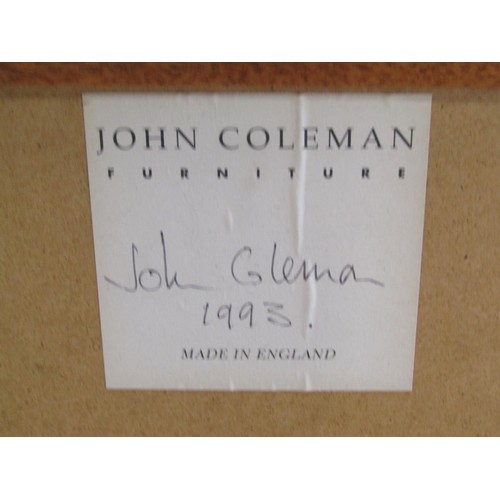 1242 - A contemporary John Coleman wall mirror with bevelled edge plate and burrwood frame labelled and dat... 