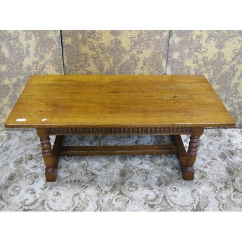 1244 - A good quality reproduction old English style oak occasional table with rectangular top over a carve... 