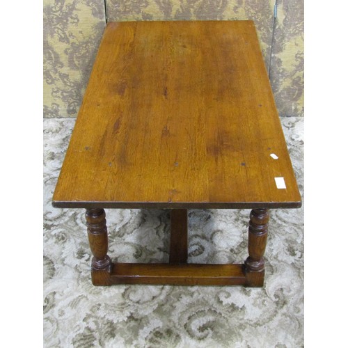 1244 - A good quality reproduction old English style oak occasional table with rectangular top over a carve... 