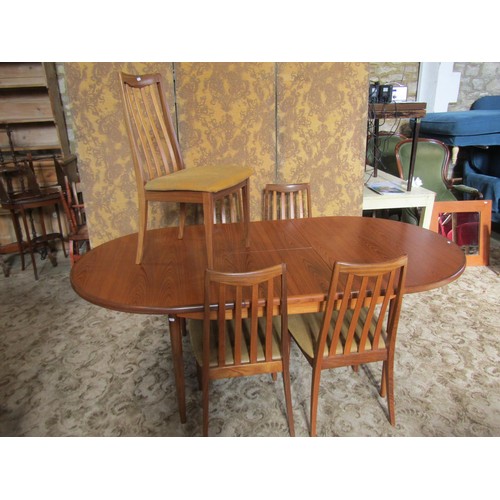 1245 - A G Plan teak D end pull out extending dining table with single additional bi-fold leaf, raised on s... 