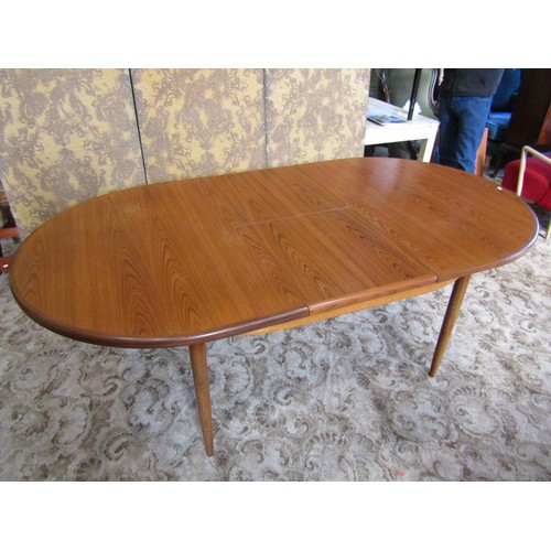 1245 - A G Plan teak D end pull out extending dining table with single additional bi-fold leaf, raised on s... 