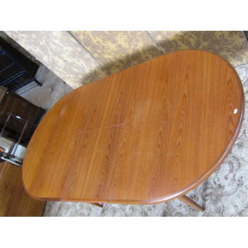 1245 - A G Plan teak D end pull out extending dining table with single additional bi-fold leaf, raised on s... 