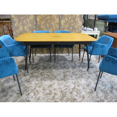 1249 - A contemporary retro style pull-out extending dining table with single additional bi-fold leaf raise... 