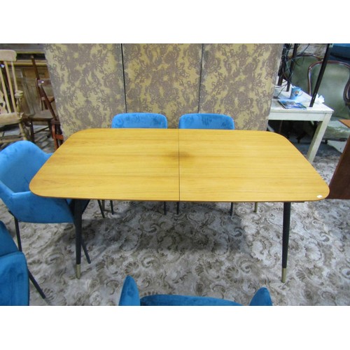 1249 - A contemporary retro style pull-out extending dining table with single additional bi-fold leaf raise... 