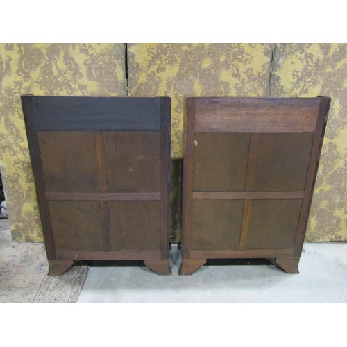 1263 - A pair of regency style mahogany dwarf waterfall bookcases with reeded outline and bracket supports,... 