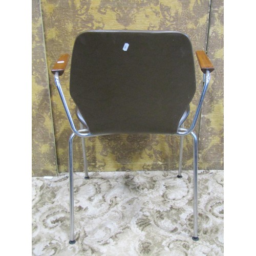 1267 - Four mid century staking armchairs with tubular steel supports