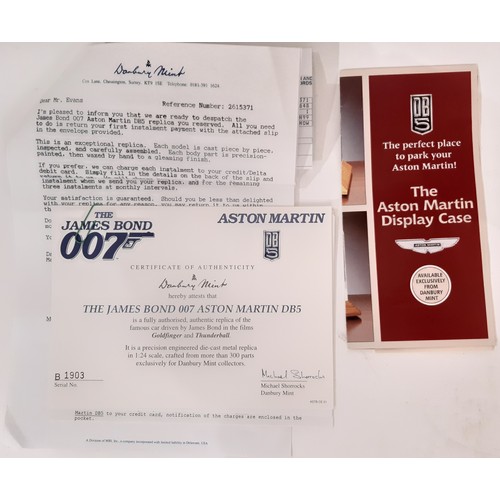 642 - James Bond Aston Martin DB5 Model by Danbury Mint in display case with hard wood base,  certificate ... 