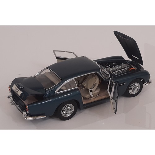 650 - 3 model Classic Cars by Danbury Mint including , 1963 Corvette Sting Ray, 1964 Aston Martin DB5 and ... 