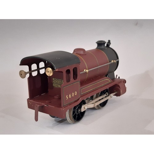 657 - Two clockwork 0 gauge Hornby locomotives including no 501 LMS 5600 in maroon livery with tender (box... 