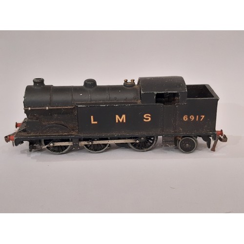 658 - Early 1950's Hornby 00 gauge railway models including a boxed Hornby Dublo EDL17 0-6-2 locomotive, u... 