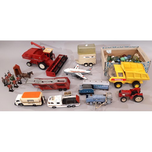 666 - Mixed collection of vintage toys including Tonka and Matchbox vehicles,  tinplate clockwork train, B... 