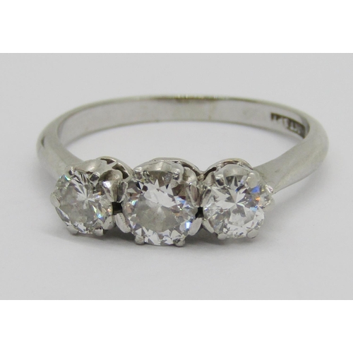 259 - 18ct white gold three stone diamond ring, centre stone 0.50ct approx, outer stones 0.20ct each appro... 