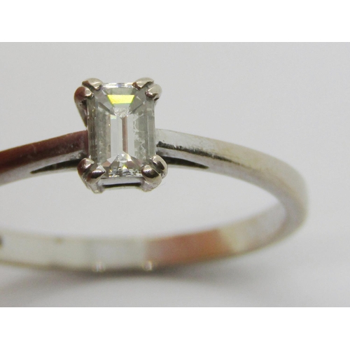 260 - 18ct white gold emerald-cut diamond solitaire ring, the stone 4.5 x 3mm approx, maker 'RG', London, ... 