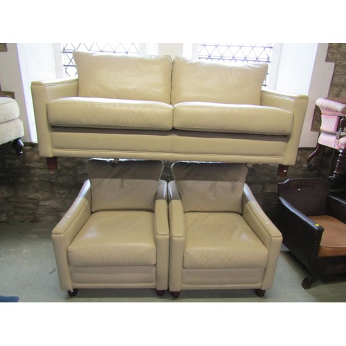 1273 - A contemporary cream leather upholstered the piece suite, the sofa 175cm long