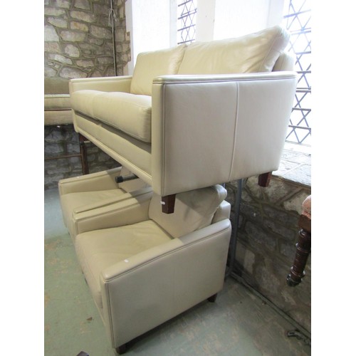 1273 - A contemporary cream leather upholstered the piece suite, the sofa 175cm long