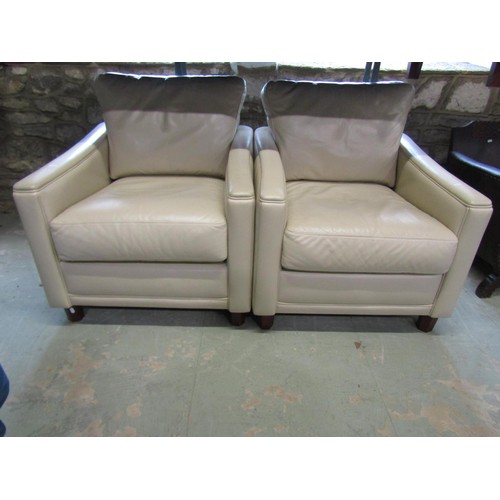 1273 - A contemporary cream leather upholstered the piece suite, the sofa 175cm long