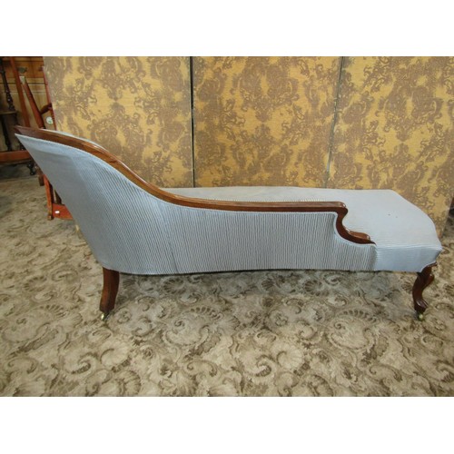 1274 - A Victorian chaise longue with upholstered seat and buttoned back within a rosewood frame, 180cm lon... 