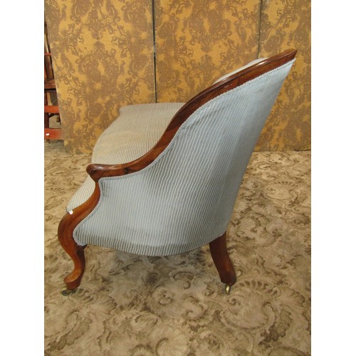 1274 - A Victorian chaise longue with upholstered seat and buttoned back within a rosewood frame, 180cm lon... 