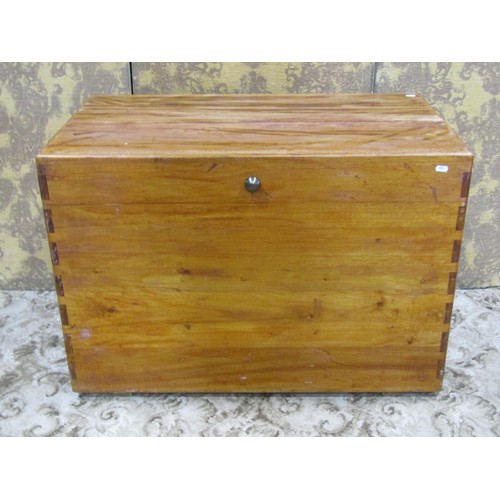 1279 - A Camphor wood trunk with hinged lid and exposed dovetail construction, 66cm high x 95xm x 56cm