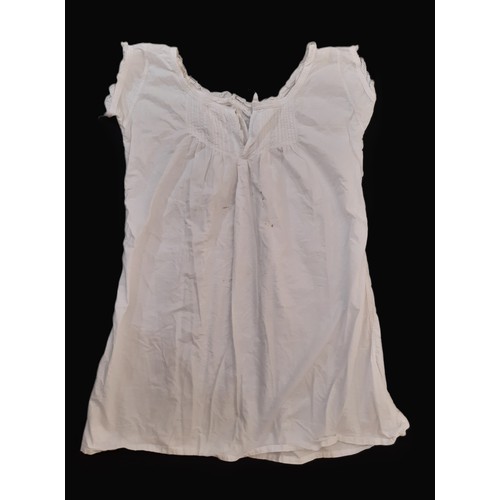 702 - Five white cotton lingerie garments from late 19th to early 20th century comprising a long petticoat... 