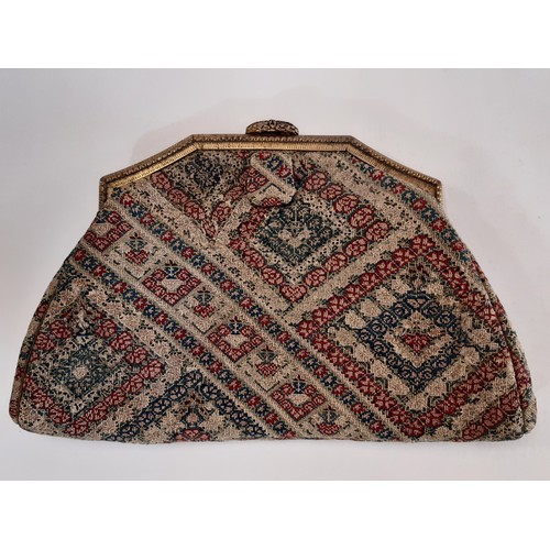 703 - A mixed collection of vintage textiles including a needlepoint evening purse 24x15cm, an Art Deco gr... 