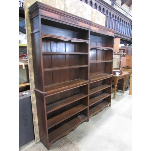 1289 - An Edwardian walnut two sectional library bookcase in the Georgian style with fixed and adjustable o... 