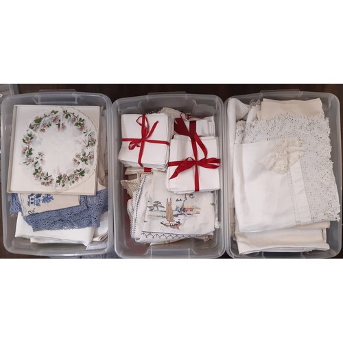 711 - 3 boxfuls of good quality household linen including damask and embroidered table cloths, bundles of ... 