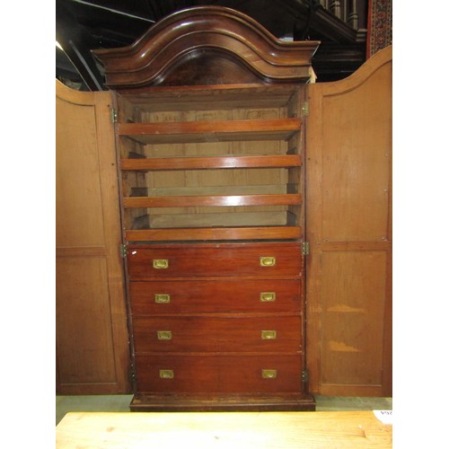 1296 - A Victorian Walnut wardrobe enclosed by a pair of full length arched panel doors with applied split ... 