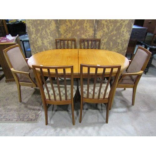 1298 - A Macintosh teak D end extending dining table with single bi-fold leaf, 76cm high x 206cm long (exte... 